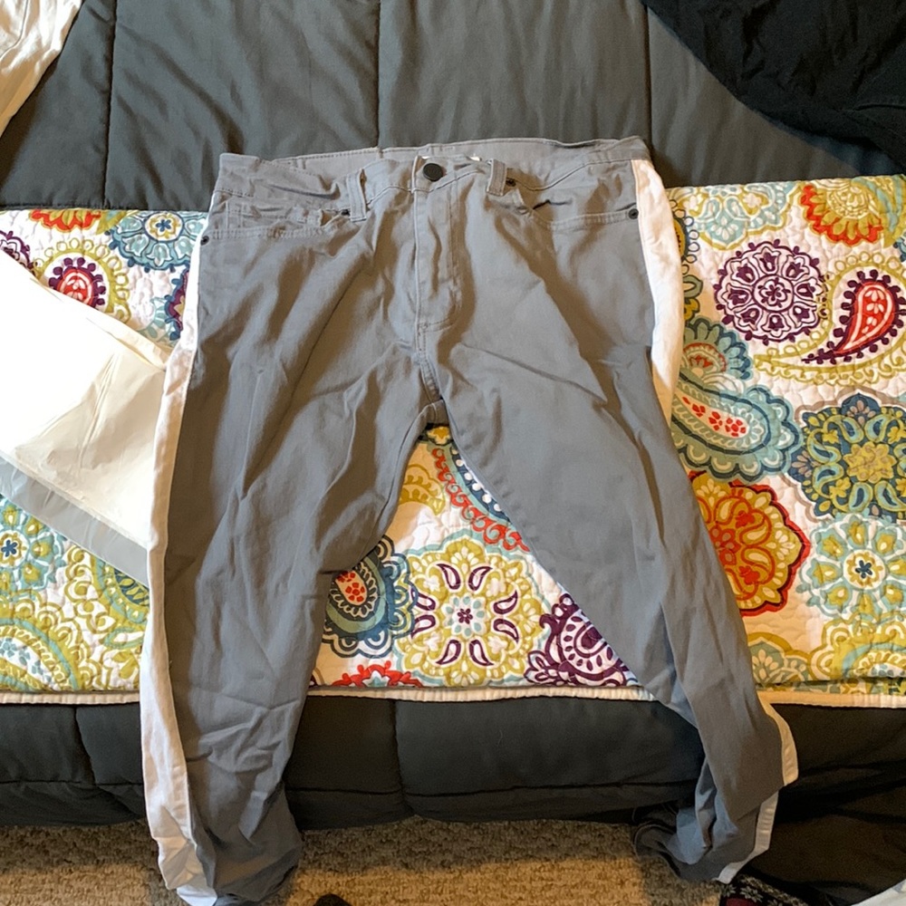 Golden Cargo pants Size 32 color Gray with white strips on the side